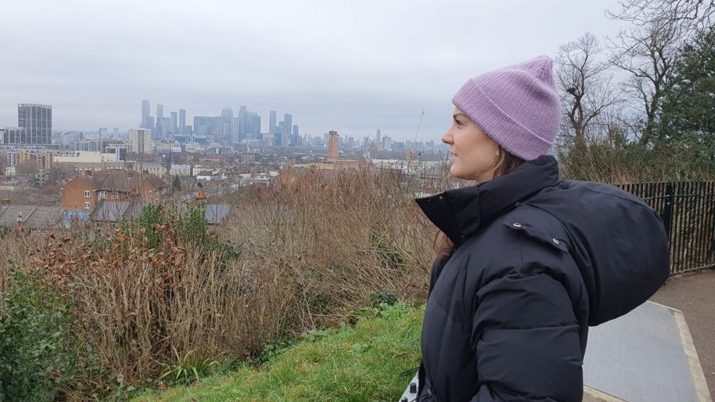 Beth looking out across south east London from Greenwich park.
