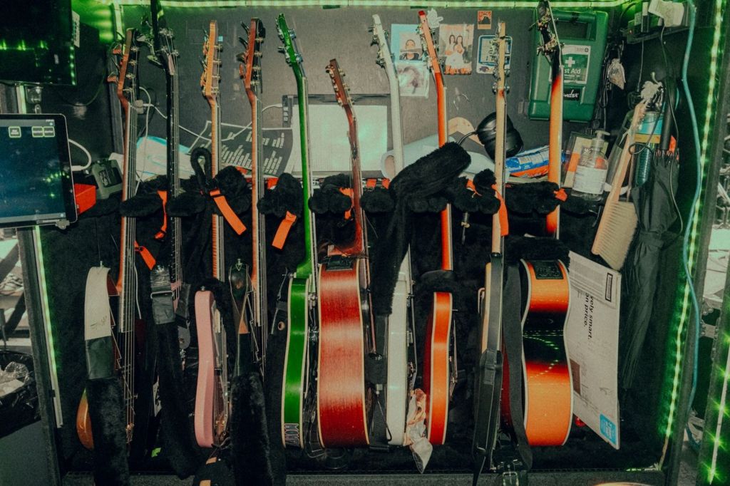 An array of guitars waiting for their moment in the spotlight
