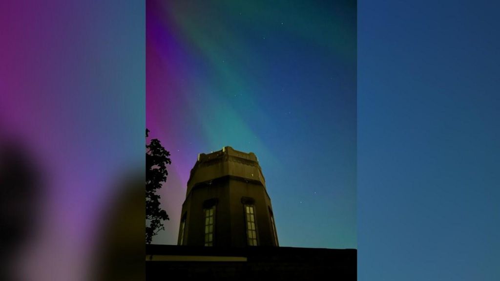 The Northern Lights seen from Handbridge in Chester, with a view of the water tower