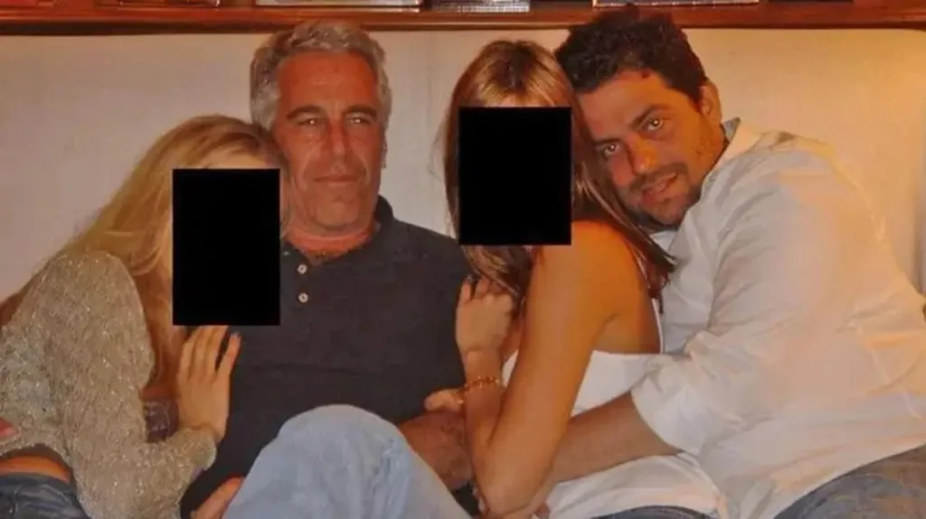 Brett Ratner and Jeffrey Epstein embrace women as they sit on a sofa together in an undated photo