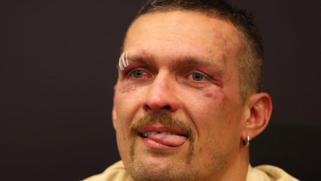 Oleksandr Usyk is teary during his news conference