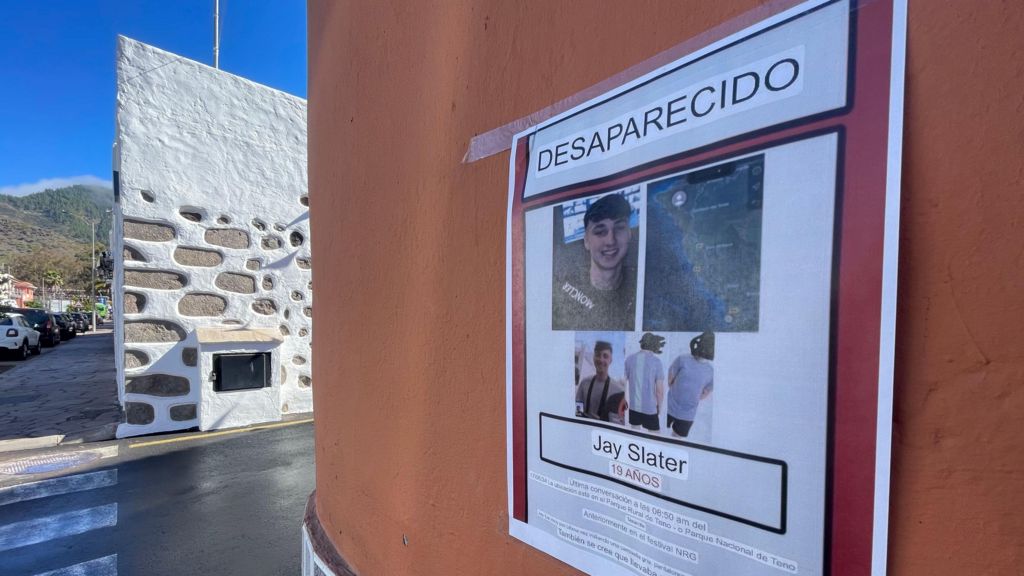 A missing poster of Jay Slater taped to a wall in Tenerife