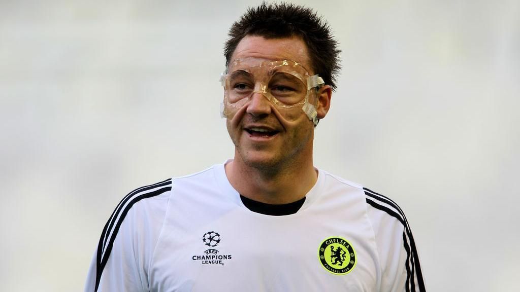 Chelsea captain John Terry in training at the Mestalla Stadium in anticipation for the 2007 Champions League fixture against Valencia, wearing a facial protective mask to protect his fractured cheek.