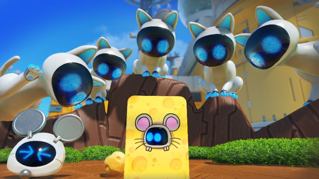 Five white, robotic cats with black screens for faces train their bright blue LED eyes on a board decorated to look like a piece of cheese with a mouse in the middle. A smaller robot peeks through a hole in the middle of the board, his blue eyes looking nervously to the side.