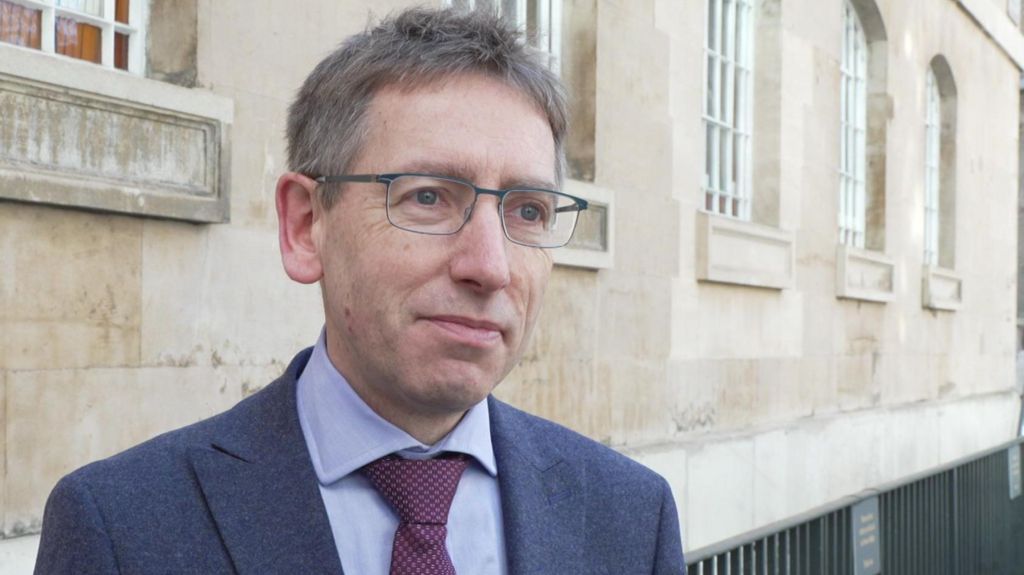 Man staning in front of church