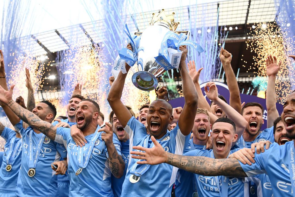 Man City lift the Premier League trophy BBC Sport