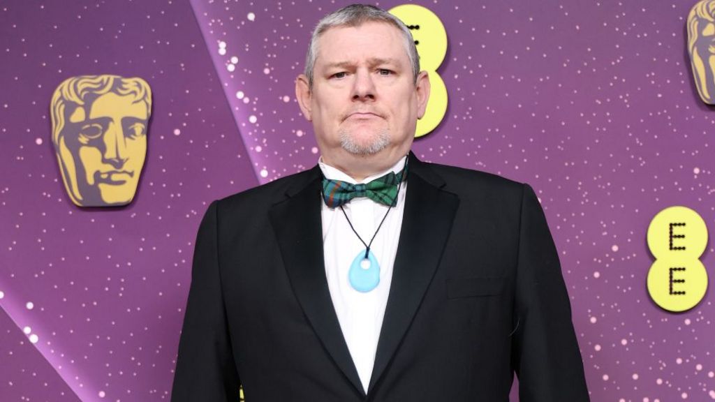John Davidson attends the 2026 EE BAFTA Film Awards at The Royal Festival Hall on February 22, 2026 in London, England