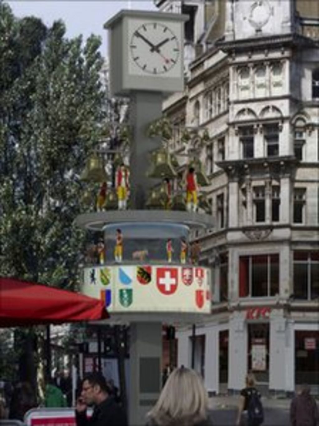 Swiss glockenspiel clock returns to Leicester Square BBC News