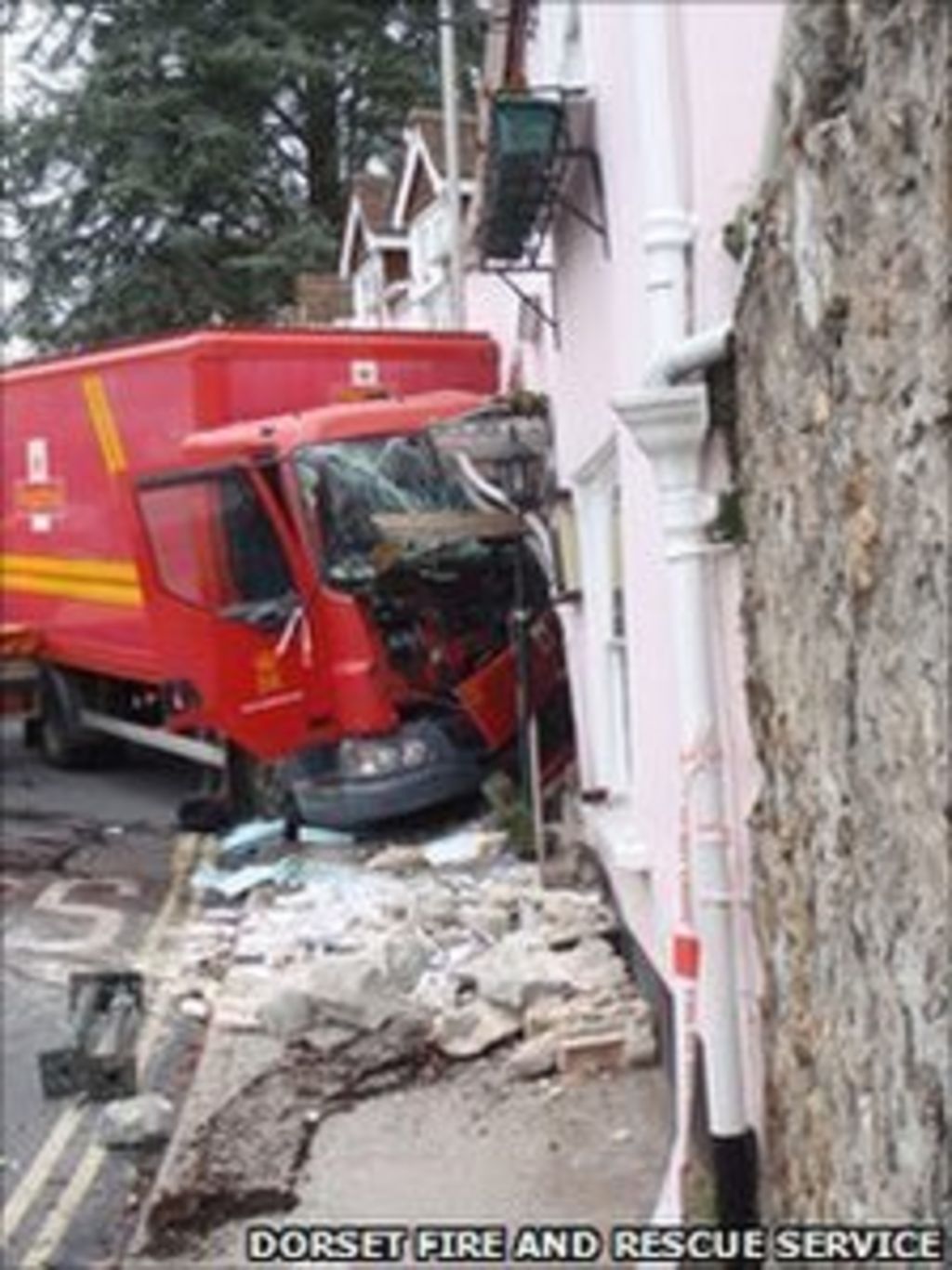 Three injured as lorry crashes into Lyme Regis hotel BBC News