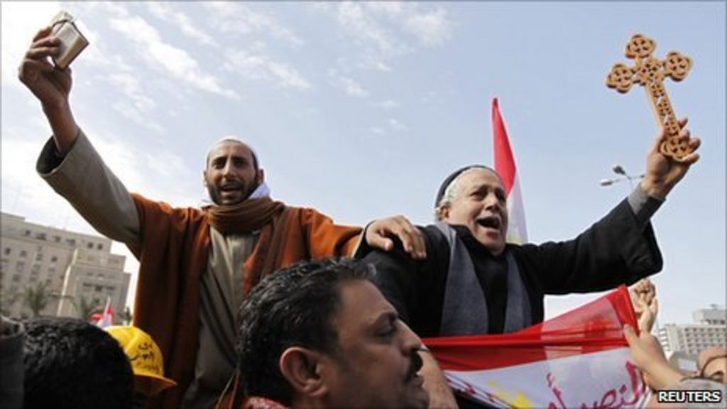 Egypts Muslims And Christians Join Hands In Protest Bbc News 3660