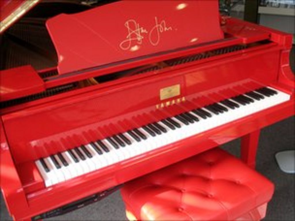 Elton John replica red piano on display in Leicester BBC News