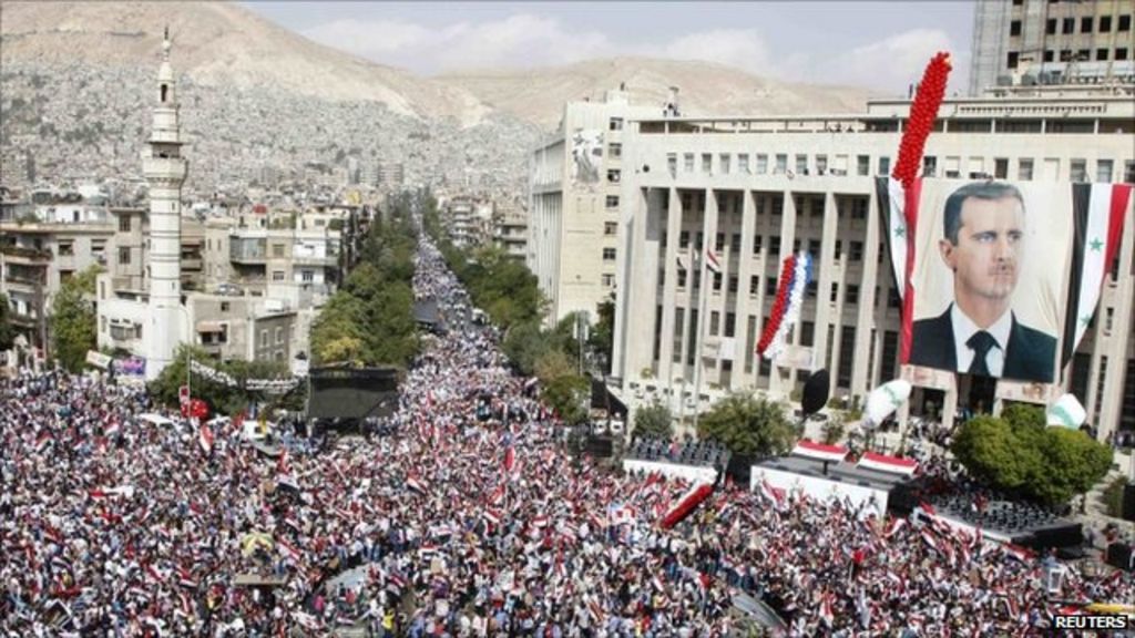 Syria unrest: Huge turnout at Damascus pro-Assad rally - BBC News