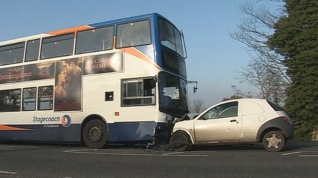 driver injured when car hits bus on a267 at mark cross bbc news