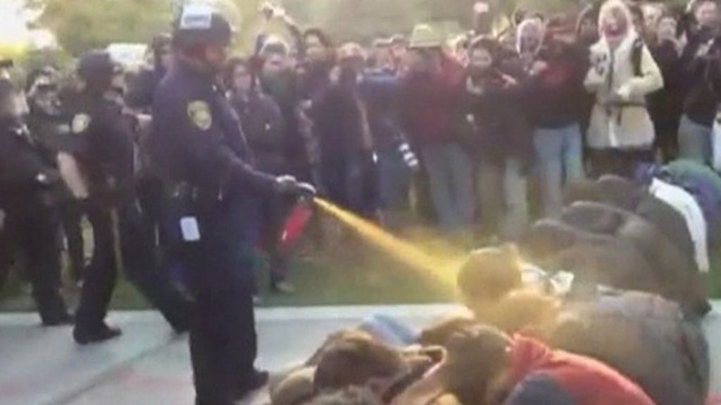 Pepper spray campus police officer awarded compensation BBC News