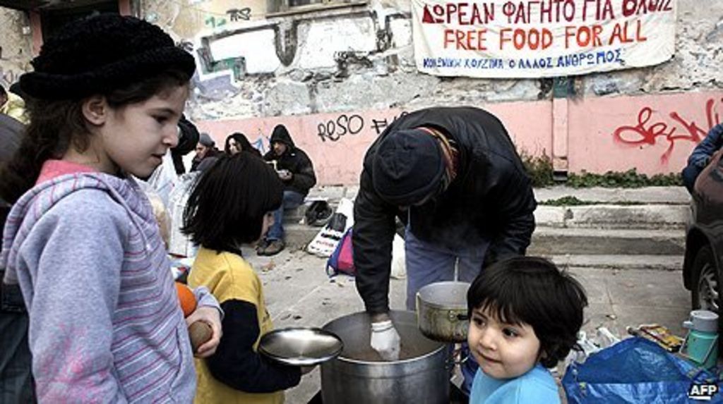 Greece's poor queue for food aid in Athens BBC News