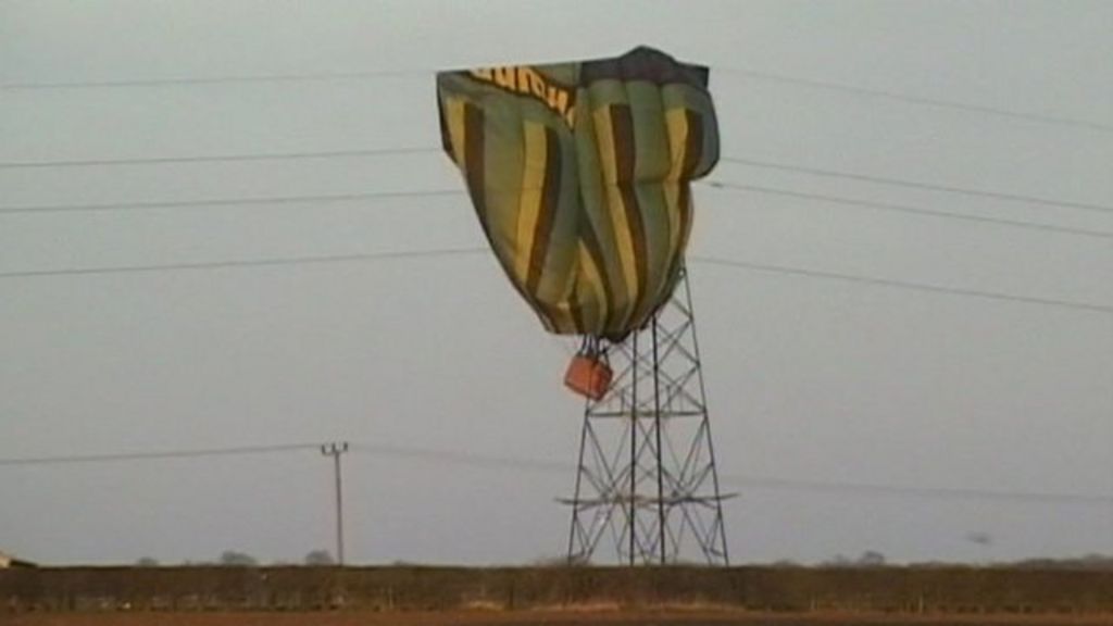 Hot air balloon hits power lines, catches fire, crashes in 
