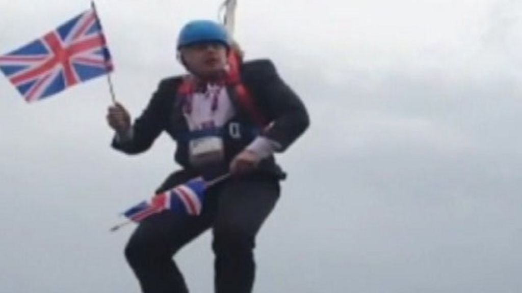 Boris Johnson left hanging on zip wire during Olympic event - BBC News