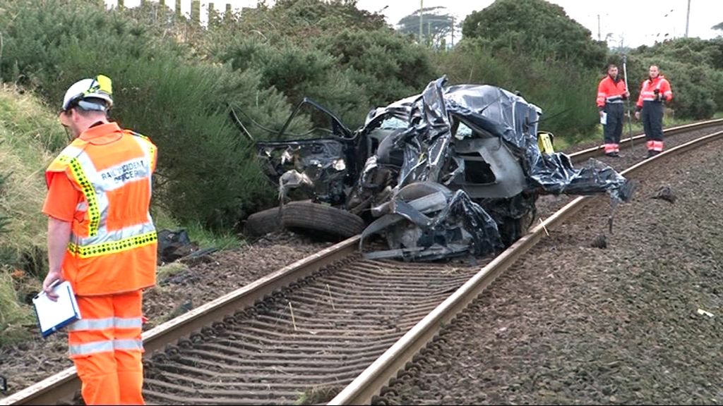 Dunragit crossing crash driver Andrew Robertson 'improving' - BBC News