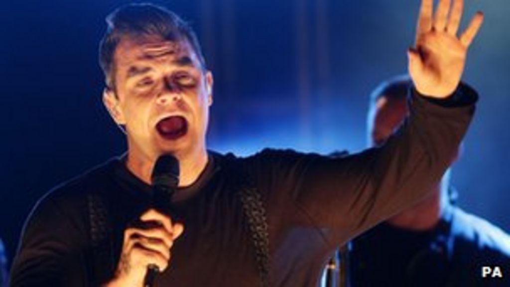 Robbie Williams tops UK single and album charts BBC News