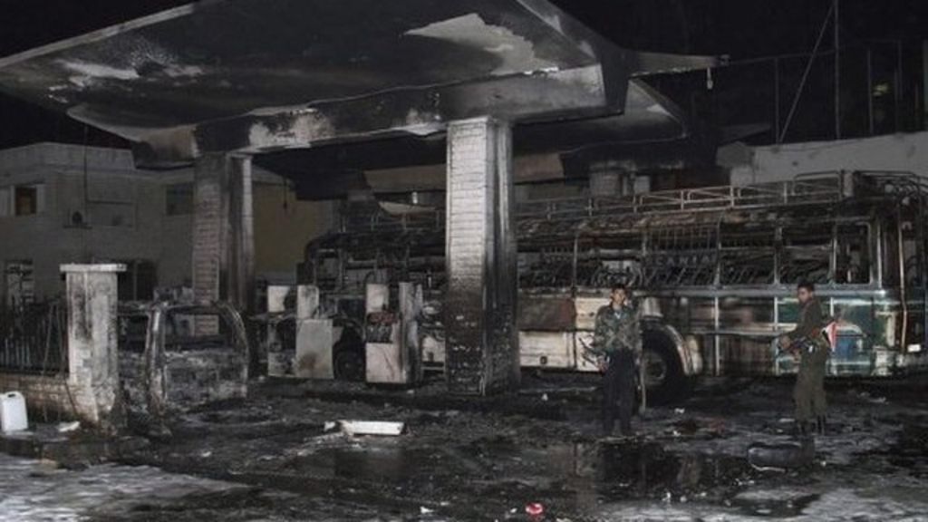 Syria petrol station hit by deadly car bomb - BBC News