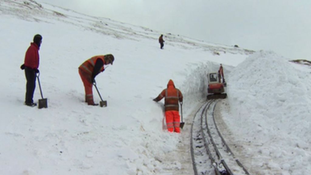 Teams clearing snow on Snowdon Mountain Railway in March, 2013