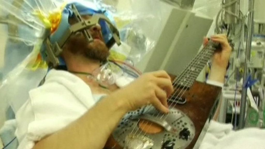 Man plays guitar during brain surgery to treat Parkinson's BBC News