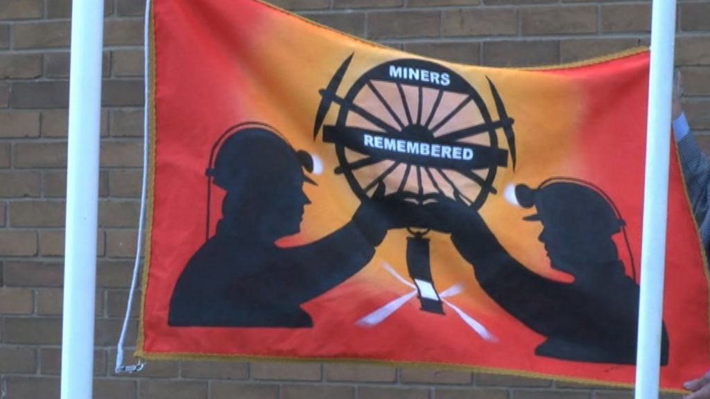 Miners' flag unveiled at Markham Main memorial BBC News