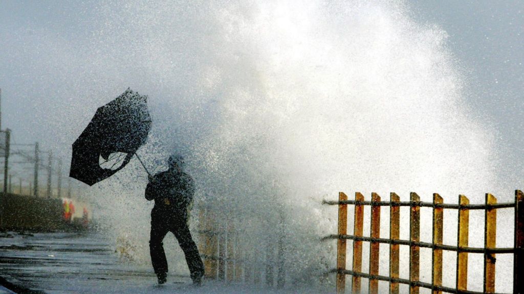 Wales battered by strong winds and heavy rain - BBC News