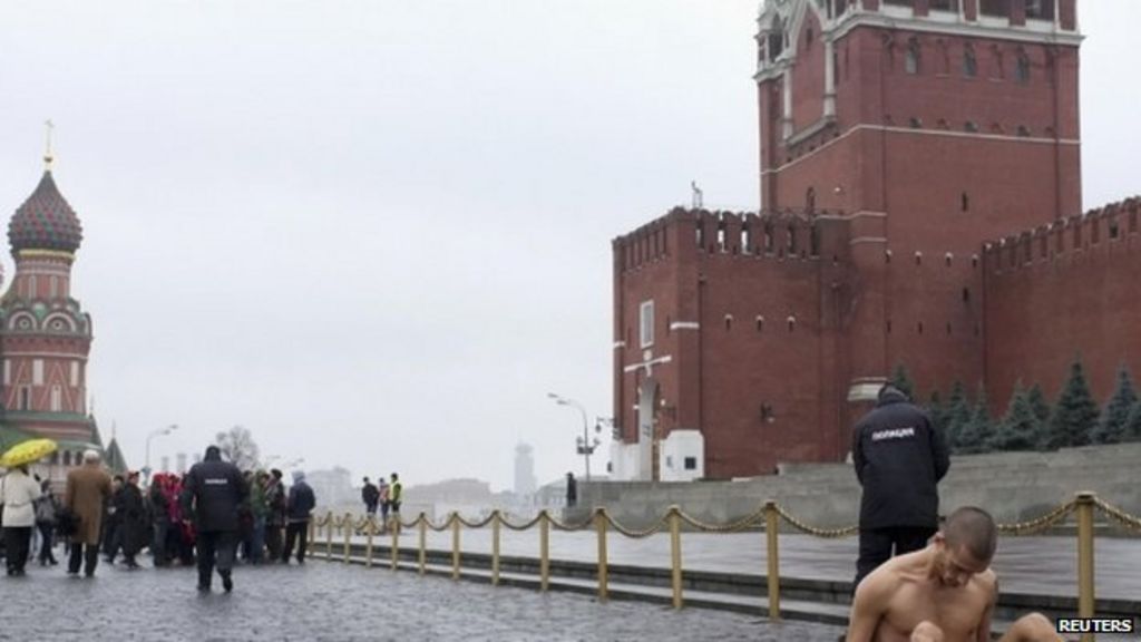 Naked Artist Nails Himself To Red Square In Protest BBC News