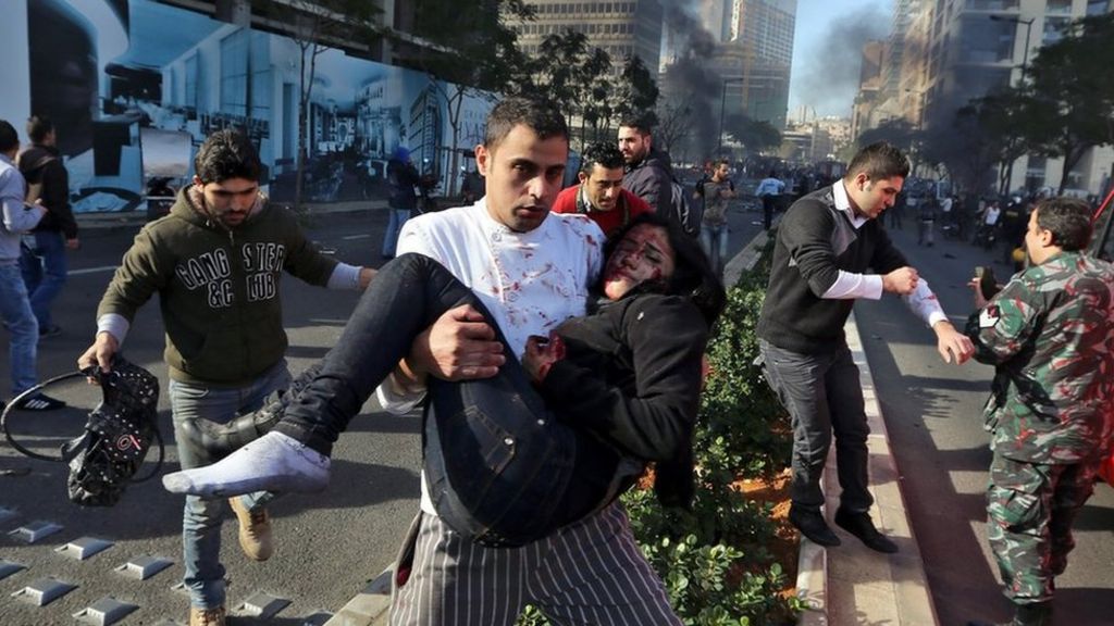 In pictures: Huge explosion in central Beirut - BBC News
