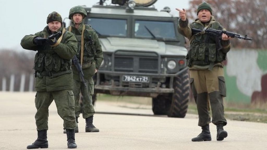 Russian Troops Fire Into Air As Ukrainians March On Crimean Airbase Bbc News 3944