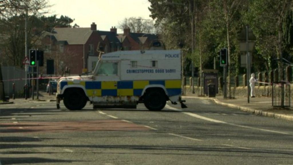 Belfast police targeted in Falls Road bomb attack - BBC News