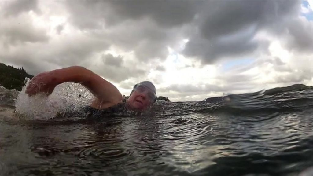 Windermere swimmers aim to break world distance record BBC News