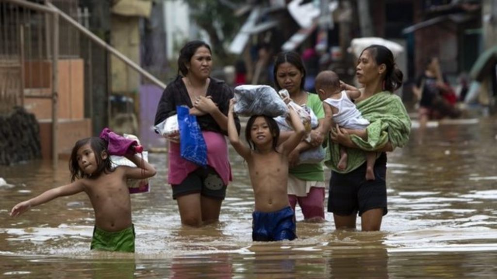 Flash floods kill at least 450 in Philippines - CBS News
