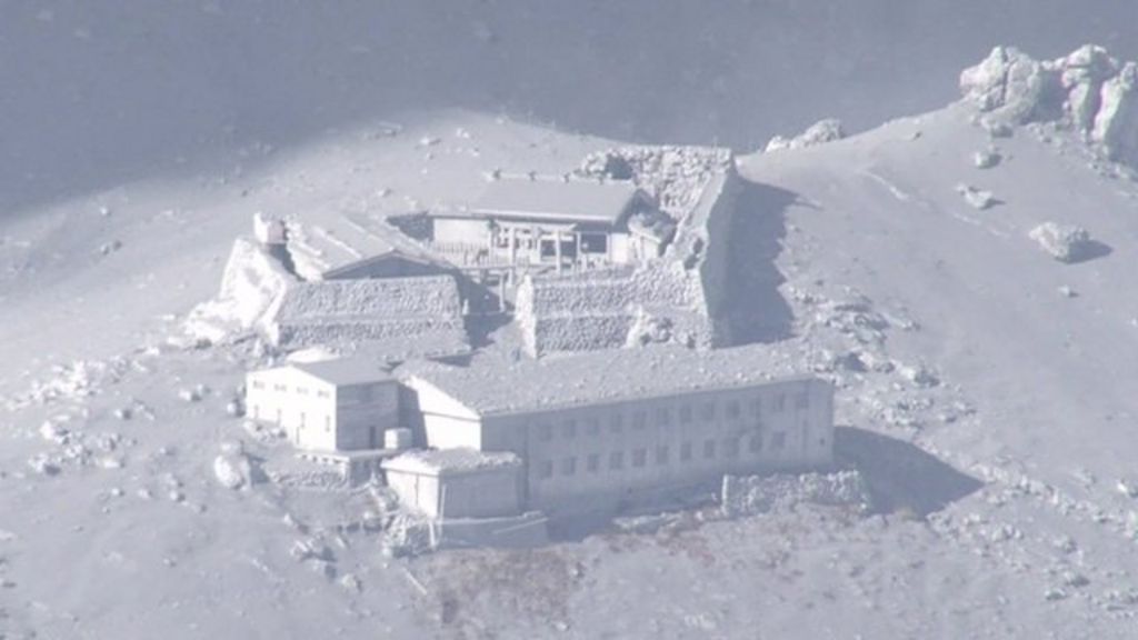 Japan volcano eruption kills at least one and traps others - BBC News