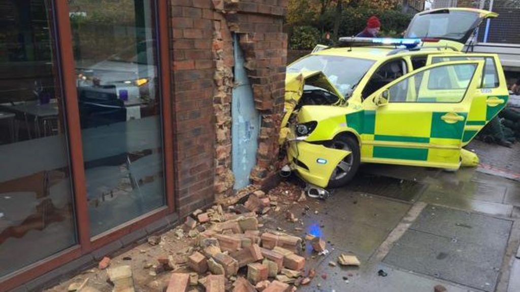 London Ambulance car crashes into restaurant BBC News