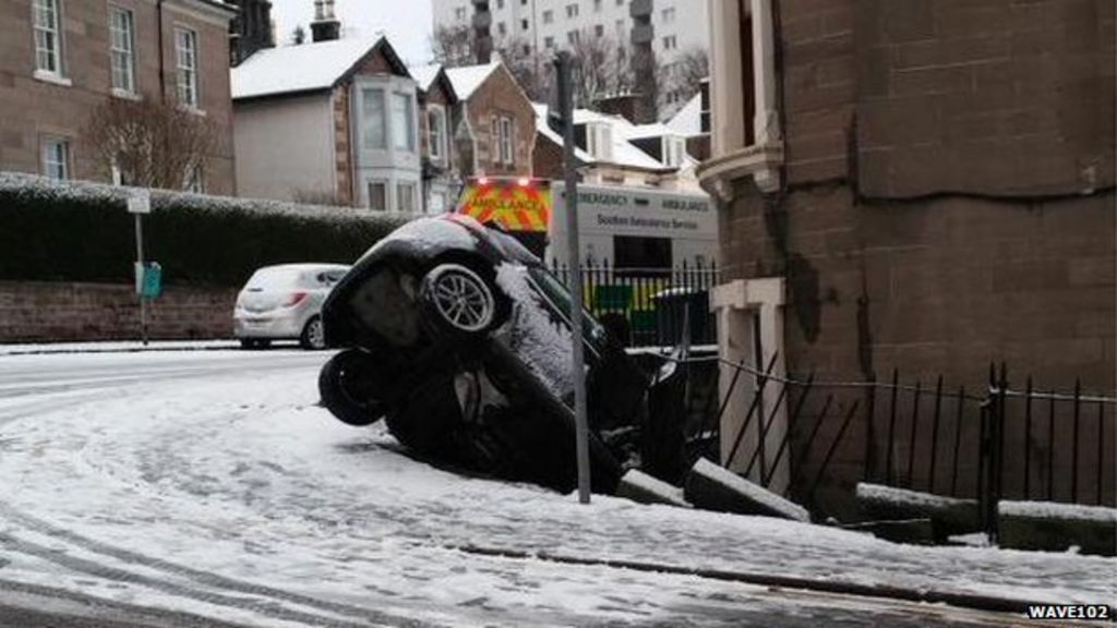 Car skids off road into house in sixcar crash in Dundee BBC News