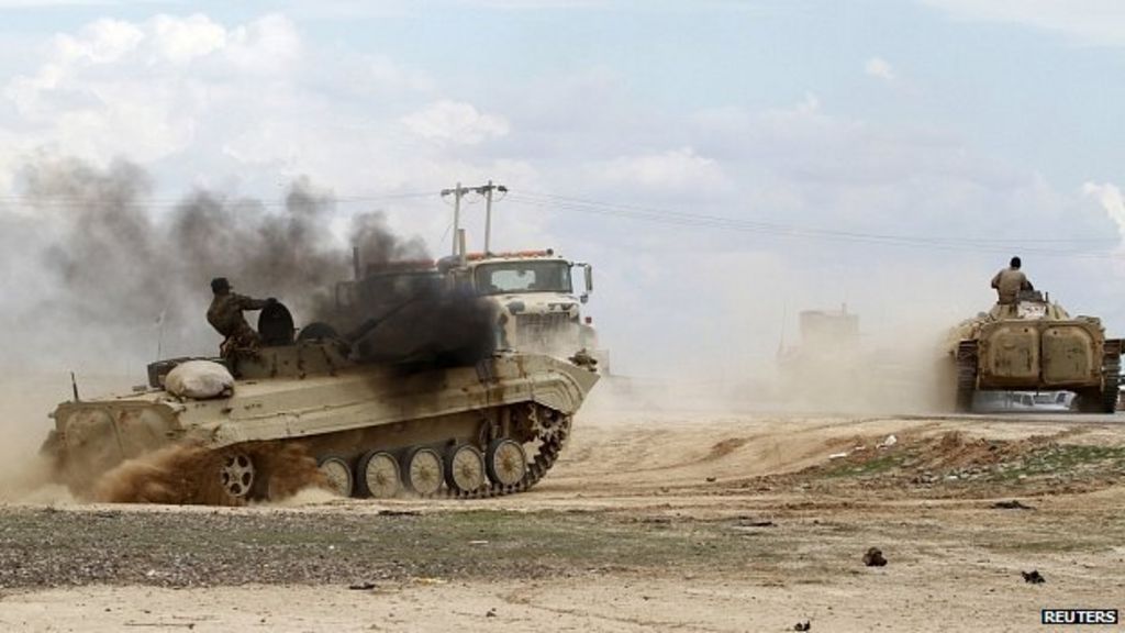 Islamic State crisis: Thousands flee Iraqi advance on Tikrit - BBC News