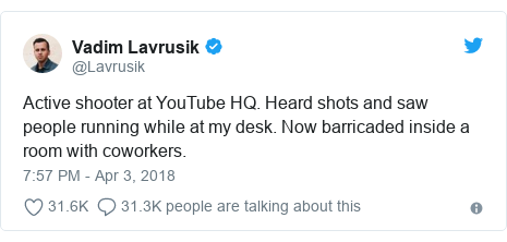 Twitter post by @Lavrusik: Active shooter at YouTube HQ. Heard shots and saw people running while at my desk. Now barricaded inside a room with coworkers.