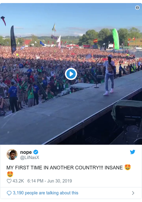 Twitter post by @LilNasX: MY FIRST TIME IN ANOTHER COUNTRY!!! INSANE 🤩🤩 