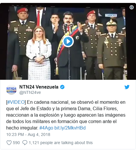 Twitter post by @NTN24ve: [#VIDEO] En cadena nacional, se observó el momento en que el Jefe de Estado y la primera Dama, Cilia Flores, reaccionan a la explosión y luego aparecen las imágenes de todos los militares en formación que corren ante el hecho irregular. #4Ago  