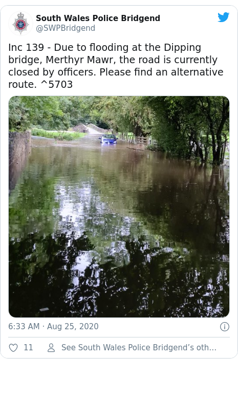 Twitter post by @SWPBridgend: Inc 139 - Due to flooding at the Dipping bridge, Merthyr Mawr, the road is currently closed by officers. Please find an alternative route. ^5703 