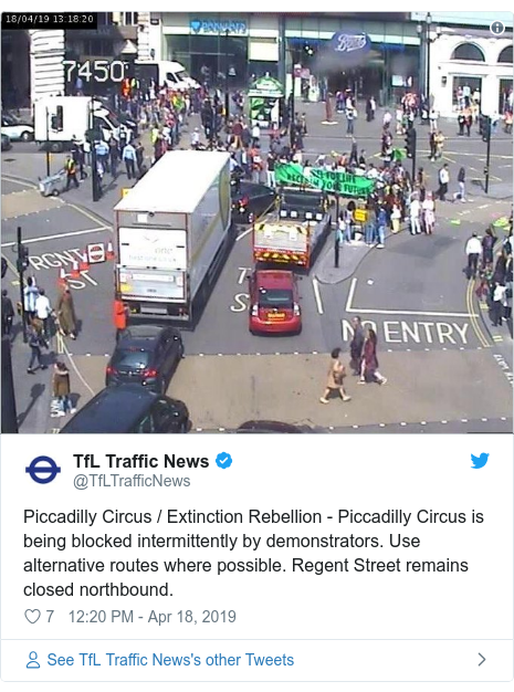 Twitter post by @TfLTrafficNews: Piccadilly Circus / Extinction Rebellion - Piccadilly Circus is being blocked intermittently by demonstrators. Use alternative routes where possible. Regent Street remains closed northbound. 