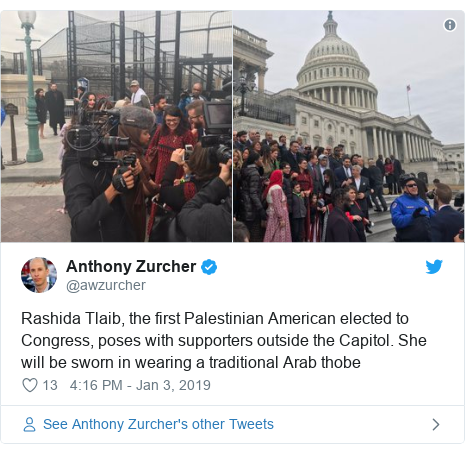 Twitter post by @awzurcher: Rashida Tlaib, the first Palestinian American elected to Congress, poses with supporters outside the Capitol. She will be sworn in wearing a traditional Arab thobe 