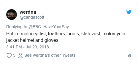 Twitter post by @candascott: Police motorcyclist, leathers, boots, stab vest, motorcycle jacket helmet and gloves.