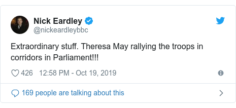 Twitter post by @nickeardleybbc: Extraordinary stuff. Theresa May rallying the troops in corridors in Parliament!!!