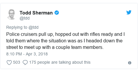 Twitter post by @tdd: Police cruisers pull up, hopped out with rifles ready and I told them where the situation was as I headed down the street to meet up with a couple team members.