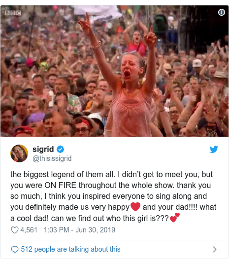 Twitter post by @thisissigrid: the biggest legend of them all. I didn’t get to meet you, but you were ON FIRE throughout the whole show. thank you so much, I think you inspired everyone to sing along and you definitely made us very happy❤ and your dad!!!! what a cool dad! can we find out who this girl is???💕 
