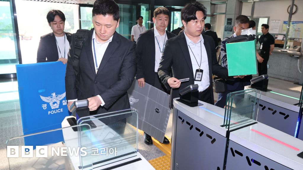 Sealed ballot boxes stacked inside the Olympic Park Handball Gymnasium in Songpa-gu, Seoul, as lawmakers from South Korea's parliamentary special committee inspect surveillance and storage arrangements