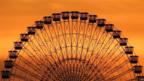 Sunset over a Ferris wheel